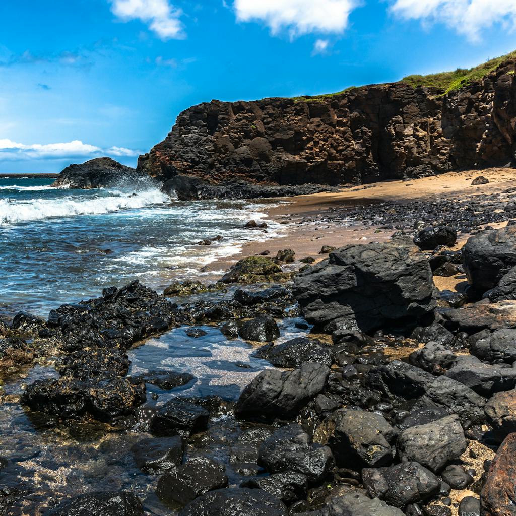 Some of the sea cliffs that likely gave Hanapepe its name